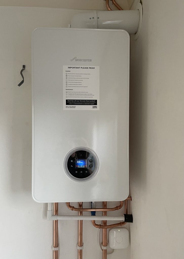 Worcester Bosch combi boiler installed neatly in a kitchen in Leeds